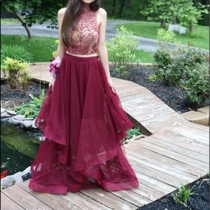 This is a two piece burgundy long dress